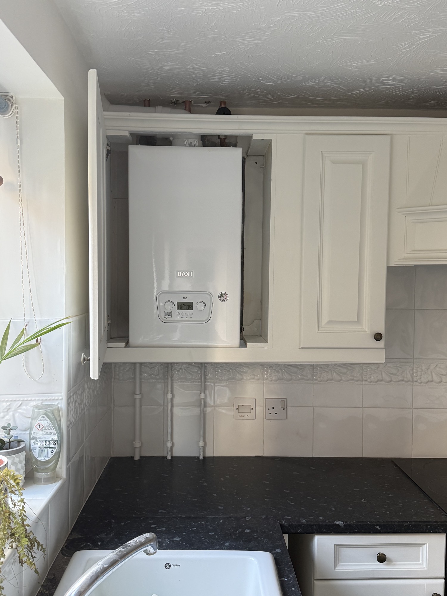 Baxi boiler installation in kitchen cupboard