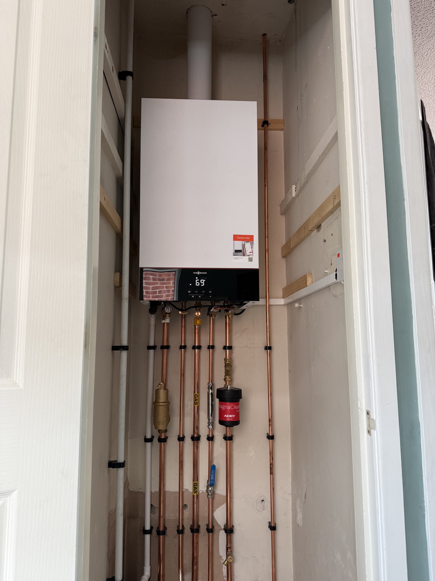 Viessmann boiler installation in cupboard